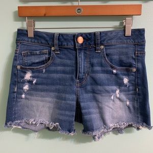Distressed Denim Midi Shorts